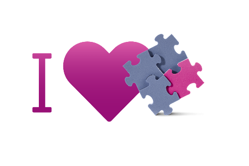 Herz neben Puzzleteilen