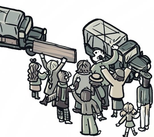 Eine Gruppe von Menschen vor zwei Lastkraftwagen